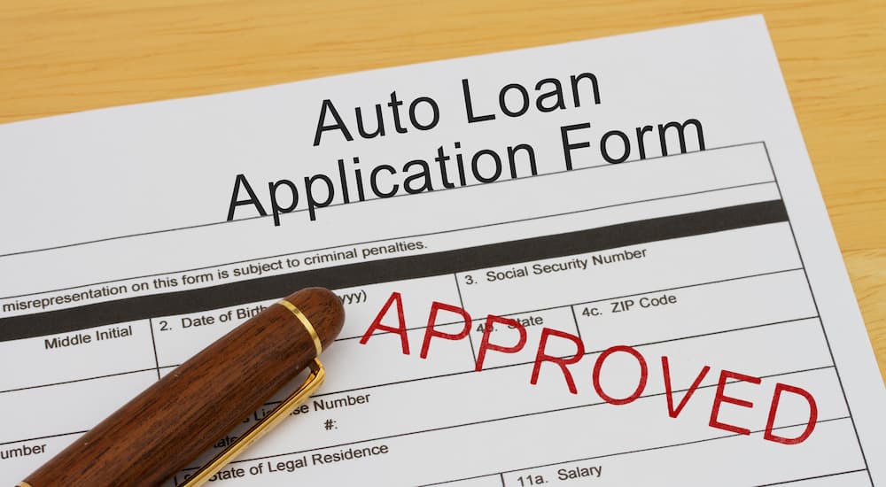 An approved application for a bad credit auto loans near Charlotte, MI is shown.